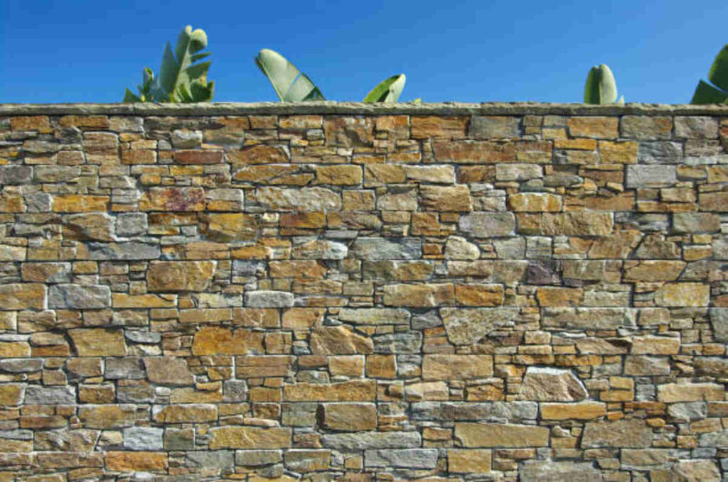 Insurance Claim for a Neighbor’s Retaining Wall Falling on My Property